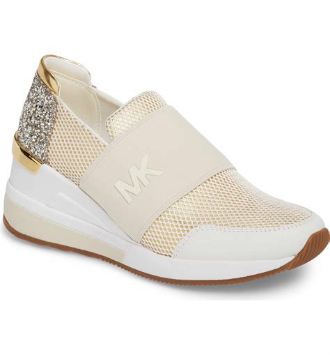 gold michael kors slip on sneakers|michael kors rhinestone sneakers.